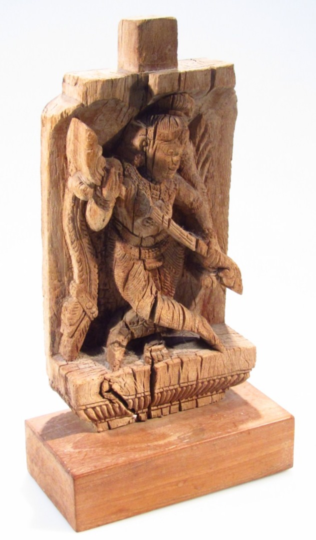 Appraisal: A carved Indian hardwood Kadi style figure from one piece