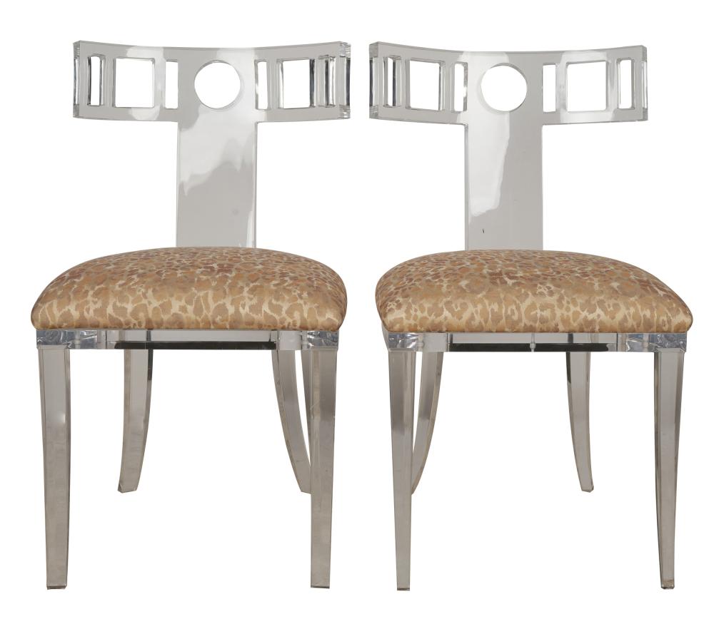 Appraisal: PAIR OF ACRYLIC SIDE CHAIRSthe seats covered with beige leopard-print