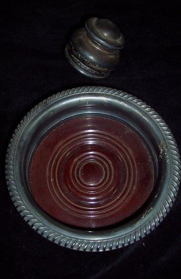 Appraisal: A wine coaster Chester with gadroon rim and wooden base