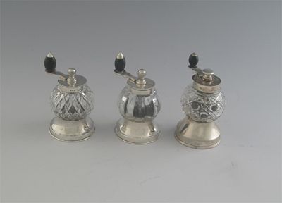 Appraisal: Three similar late Victorian Edwardian mounted cut glass pepper mills