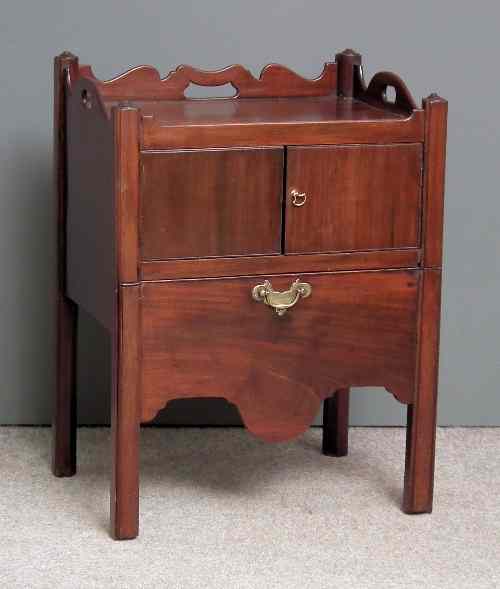 Appraisal: A George III mahogany tray top night commode the shaped