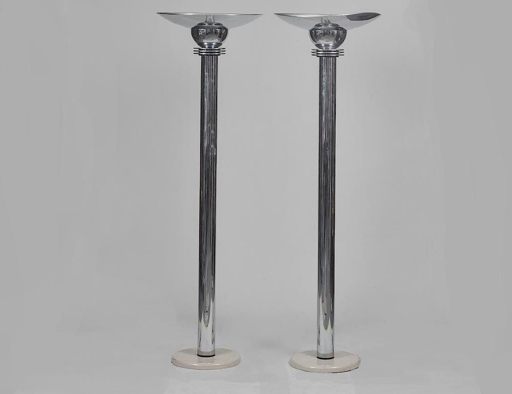 Appraisal: PAIR OF POLISHED CHROME TORCHIERS Executed in the Deco manner