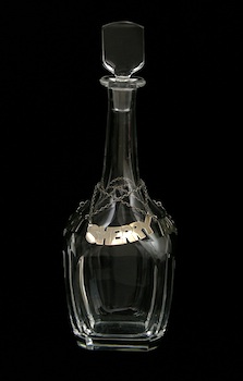 Appraisal: An Orrefors Crystal Decanter with Three Sterling Silver Labels Panel