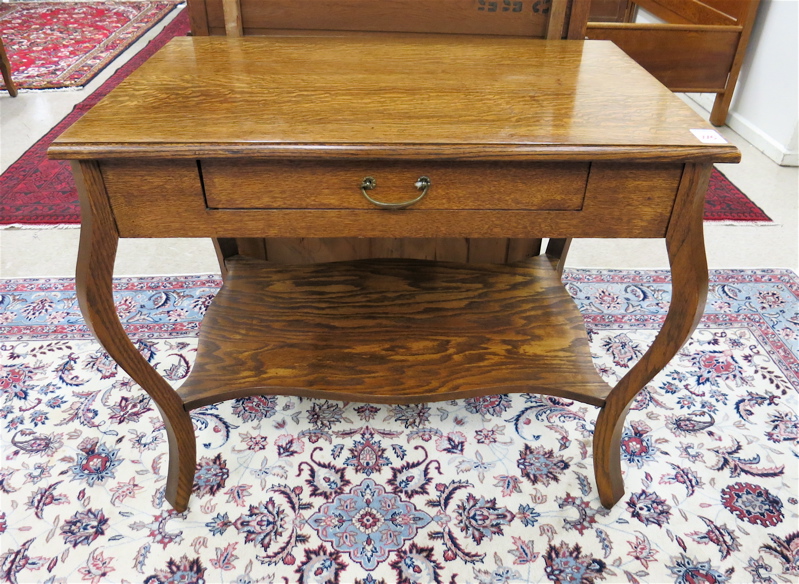 Appraisal: AN OAK LIBRARY TABLE American c having a rectangular oak