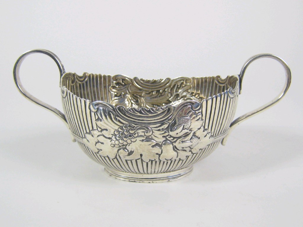 Appraisal: A Victorian two handled oval Sugar Bowl with fruit embossing