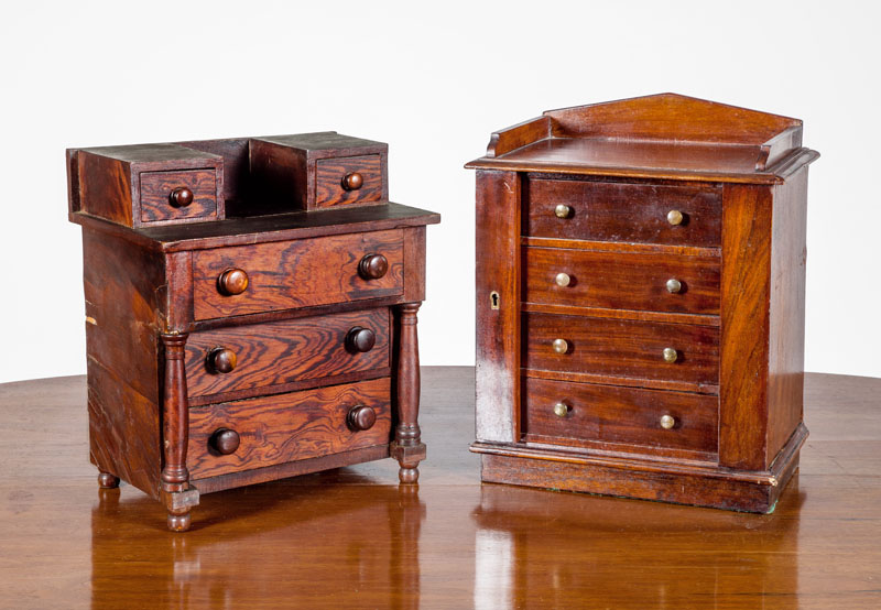 Appraisal: TWO VICTORIAN MAHOGANY MINIATURE CHESTS OF DRAWERS One a Wellington