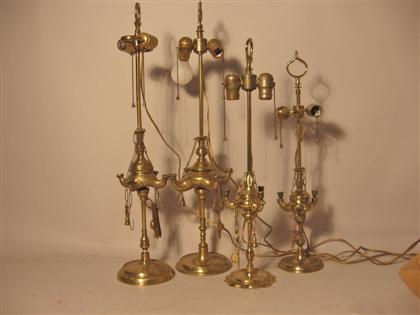 Appraisal: Four piece Decorative Brass Hookah Pipes Converted into lamps Hts