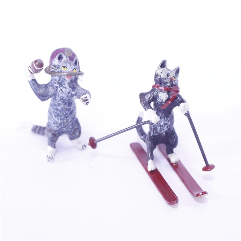 Appraisal: Two Austrian Bronze cold painted anthropomorphic whimsical Cats skiing and