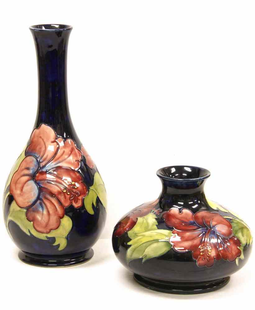 Appraisal: MOORCROFT VASES - Squatty Footed Moorcroft Vase decorated with large