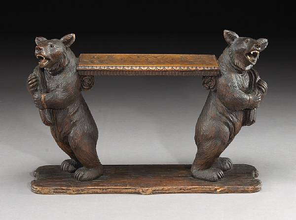 Appraisal: A Black Forest lindenwood bench late th early th century