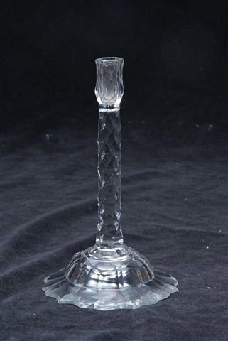 Appraisal: A GLASS TAPER STICK with a facet cut stem th