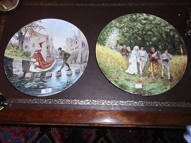 Appraisal: A MONTEREAU POTTERY PLAQUE painted with a continental scene after