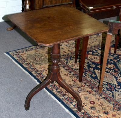 Appraisal: A th Century mahogany tilt top occasional table on turned