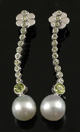 Appraisal: A pair of South Sea pearl and peridot earrings Comprising