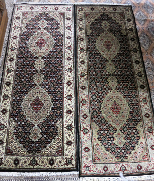 Appraisal: TWO SIMILAR HAND KNOTTED ORIENTAL AREA RUGS Persian Bidjar design