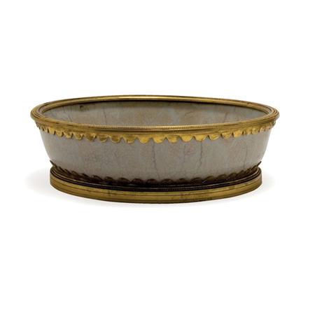 Appraisal: Chinese Gilt-Metal Mounted Porcelain Dish Estimate -