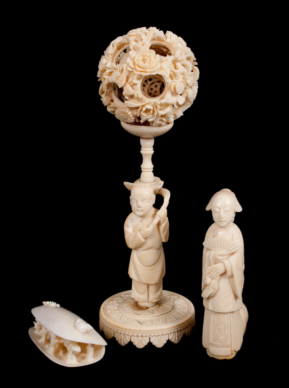 Appraisal: Three oriental carved ivory objects including Japanese geisha cane handle