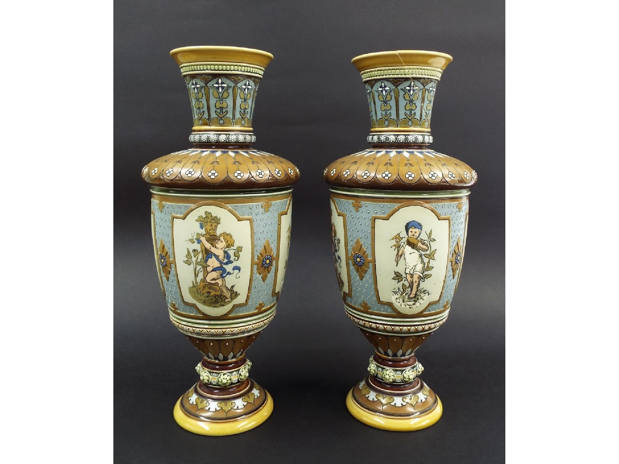 Appraisal: Two Villeroy Boch Mettlach stoneware baluster vases decorated with panels