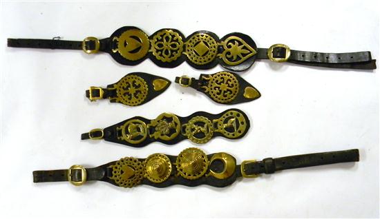 Appraisal: Five horse brasses of varying lengths black leather two longest