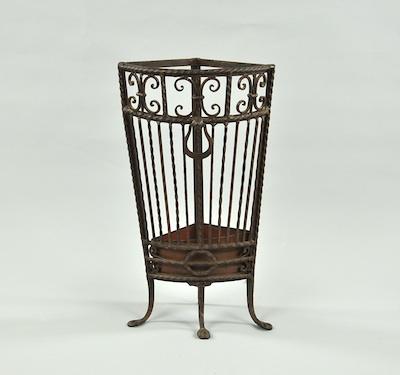 Appraisal: A Wrought Iron Corner Umbrella Stand With the openwork body