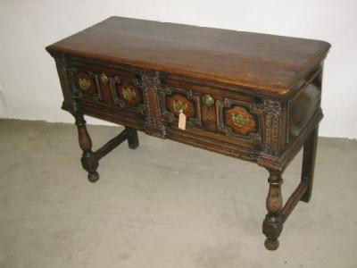 Appraisal: A VICTORIAN CARVED OAK LOW DRESSER the moulded edged top