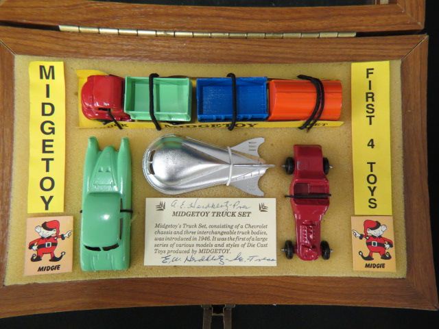 Appraisal: Midgetoy Metal Toy Set with first toys in truck racer