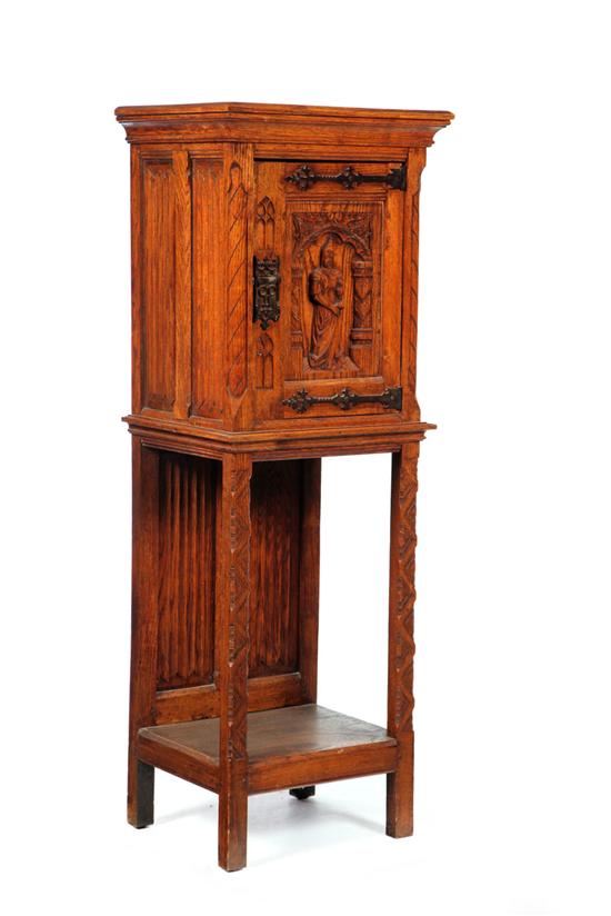 Appraisal: CARVED CABINET European early th century oak Diminutive cabinet on