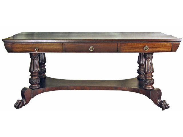 Appraisal: Beautiful th century mahogany writing table with three drawers supported