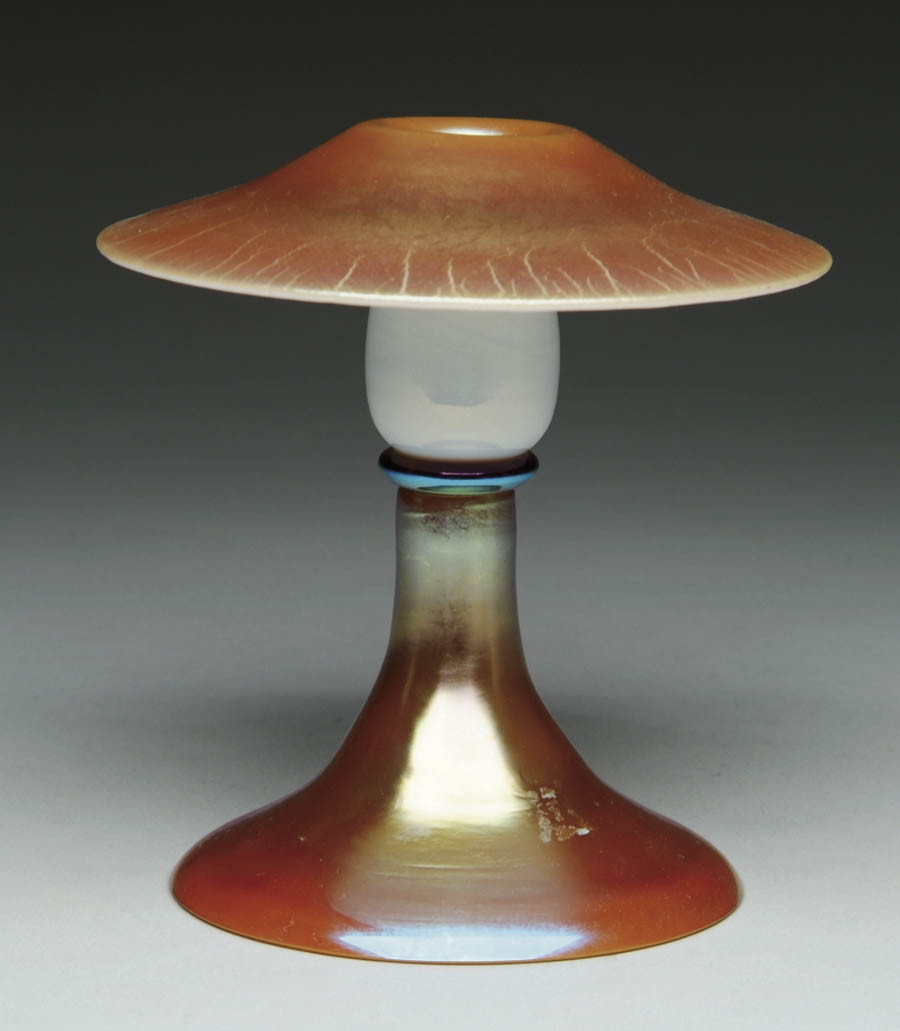 Appraisal: STEUBEN AURENE CALCITE CANDLESTICK Beautiful Steuben candlestick is iridescent gold