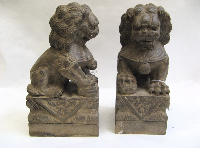 Appraisal: PAIR GRANITE SCULPTED CHINESE FOO LIONS Each seated with a