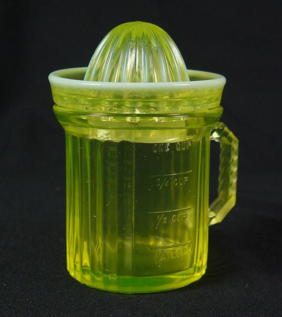 Appraisal: Vaseline Glass Measuring Cup with Juice Cover Circa x cup