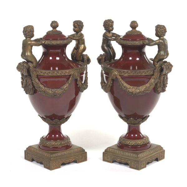 Appraisal: PAIR OF PORCELAIN AND BRONZE URNS x Deep crimson in