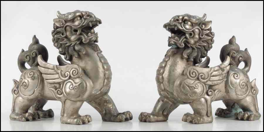 Appraisal: PAIR OF CHINESE METAL FOO DOGS H '' W ''