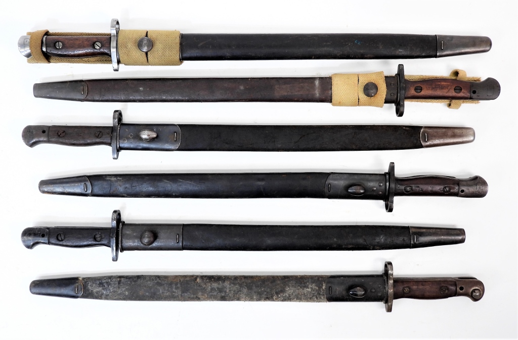 Appraisal: SIX COMMONWEALTH PATTERN BAYONETS SCABBARDS A Chapman-marked bayonets and scabbard