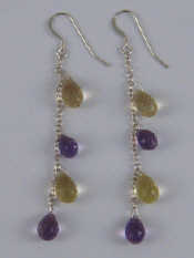 Appraisal: A pair of white metal tests silver faceted amethyst and