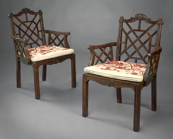 Appraisal: A pair of George III style mahogany open armchairs commissioned