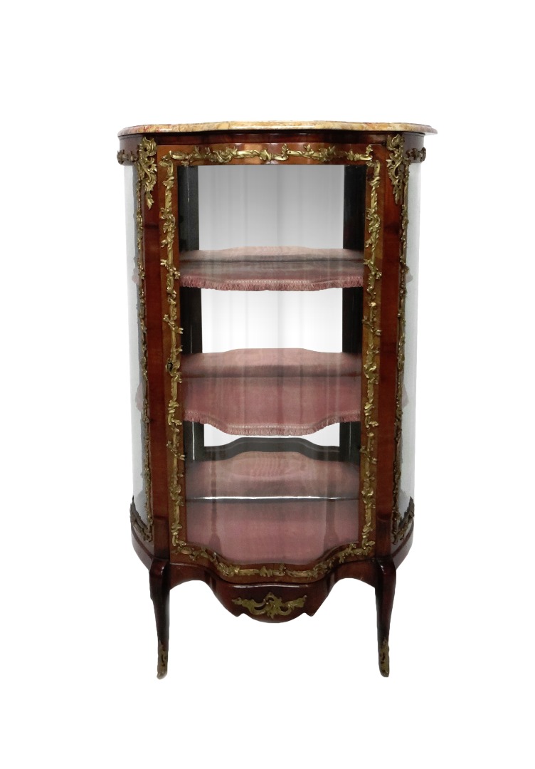 Appraisal: A Louis XV style vitrine the shaped marble top over