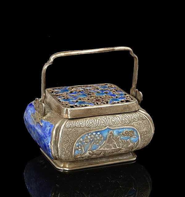 Appraisal: A Chinese silver and blue enamel incense burner th Centuryembossed