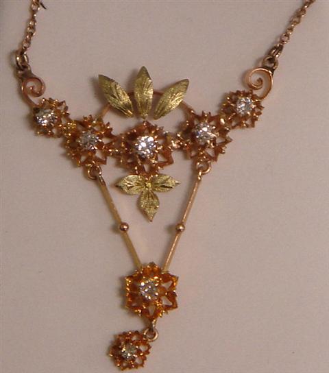 Appraisal: K YG pendant necklace set with diamonds x pendant Estimate