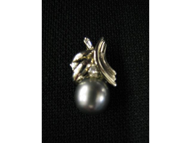 Appraisal: South Seas Tahitian Black Pearl Pendant mm highlighted by diamonds