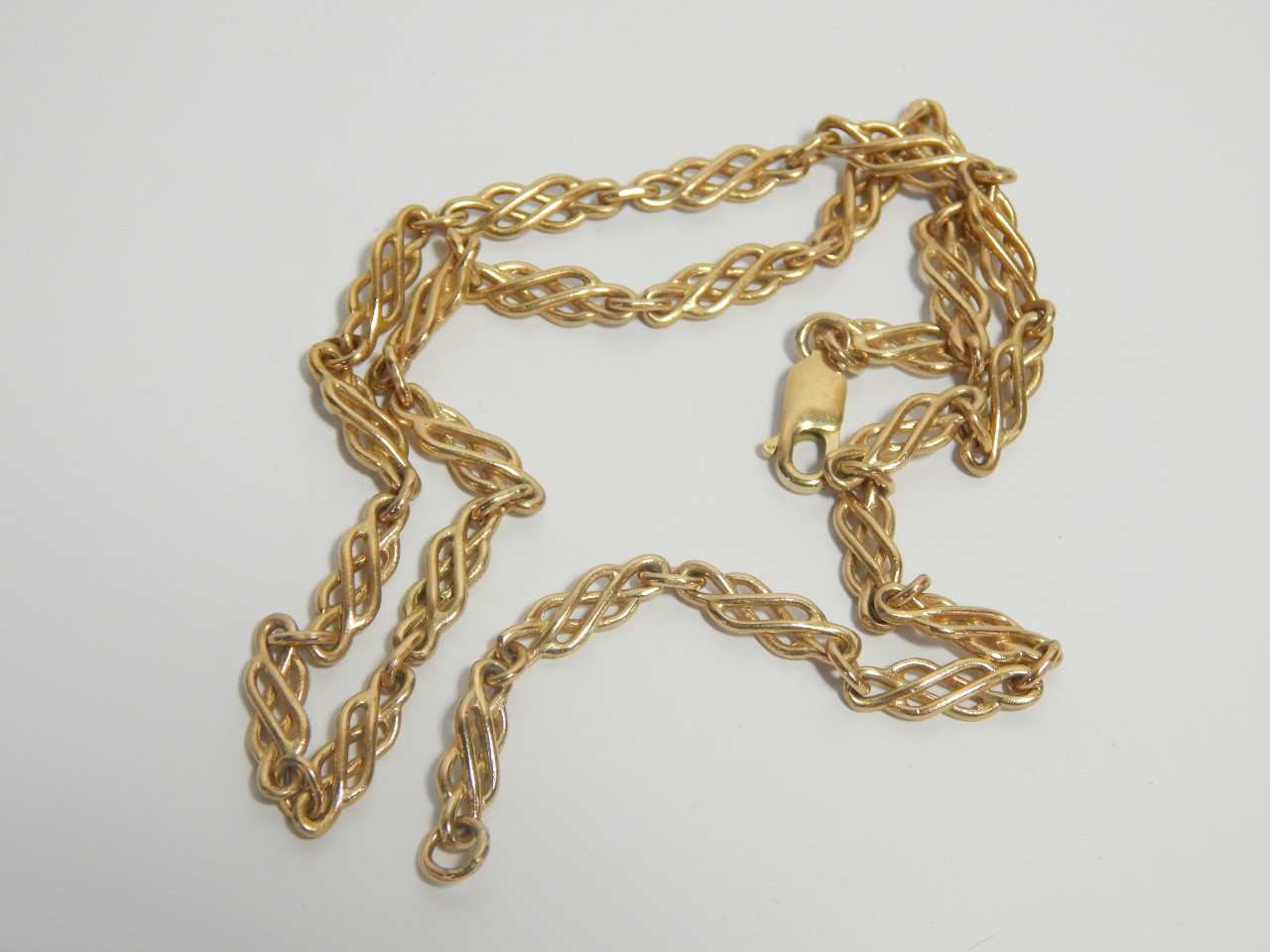 Appraisal: A ct gold fancy link neck chain on a snap