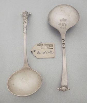 Appraisal: A pair of George II large sauce ladles with lion