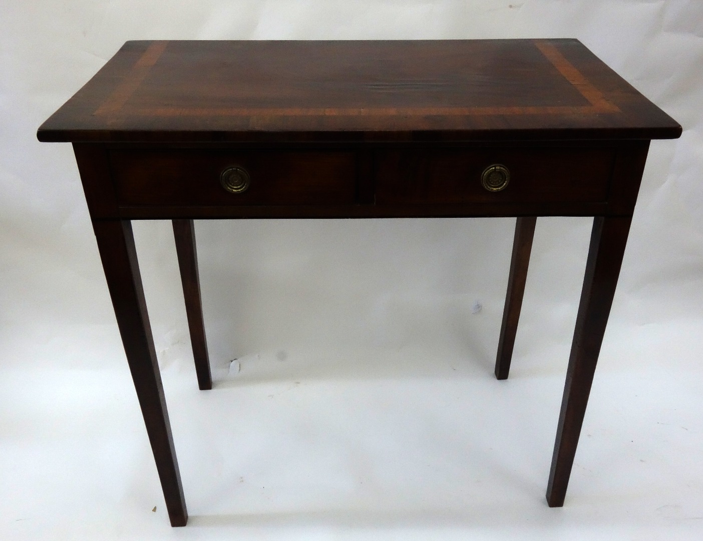 Appraisal: A George III mahogany ebony banded side table the rectangular