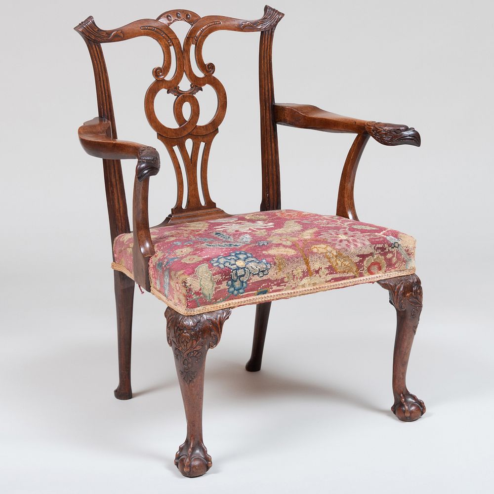 Appraisal: George III Carved Walnut Armchair Armrests terminating in eagles' heads