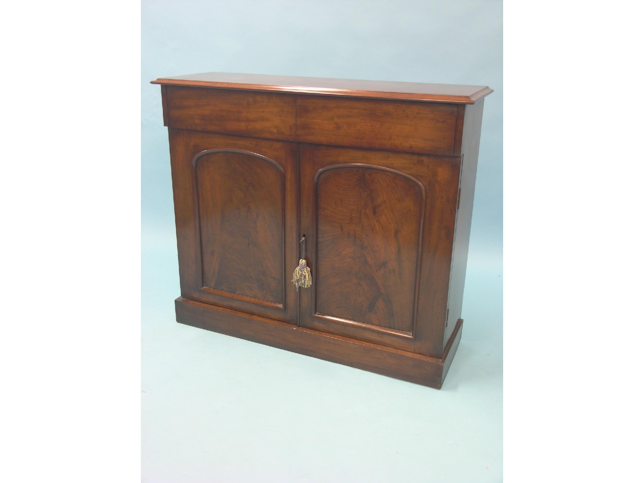 Appraisal: A Victorian mahogany chiffonier pair of frieze drawers above panelled