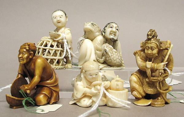 Appraisal: Five ivory figural netsuke Including a tinted portrayal of the