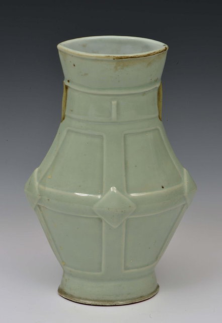 Appraisal: A CHINESE PALE BLUE GLAZE ARCHAIC BRONZE GU SHAPED VASE