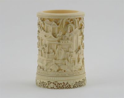 Appraisal: A Chinese ivory carved Canton brushpot delicately decorated with many