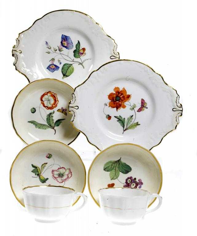 Appraisal: A PAIR OF ROCKINGHAM BREAKFAST CUPS AND THREE SAUCERS AND