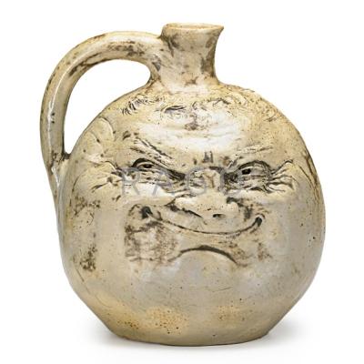 Appraisal: ROBERT W MARTIN - MARTIN BROTHERS Glazed stoneware face jug